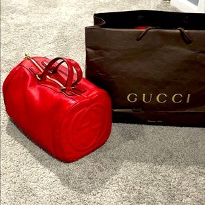 - Red Gucci handbag